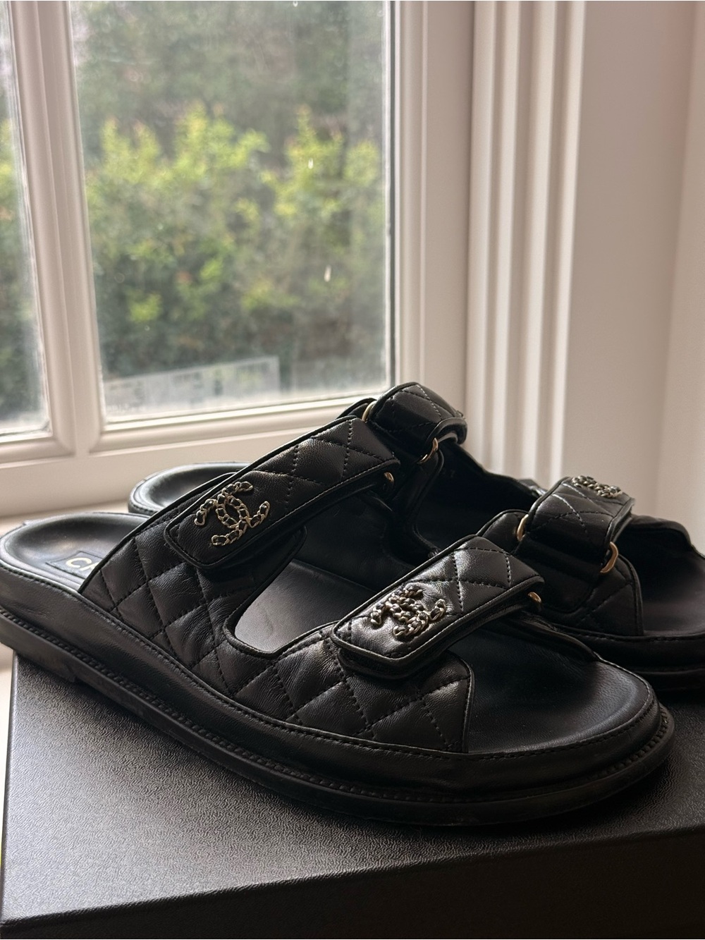 CHANEL Black Quilted Leather Slide Sandals with Logo Straps